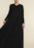 Black colour. Cut in 100% cotton jersey with a fitted bodice & voluminous drop. Styling details include a round neckline with subtle pleats. Features button fastenings on the back & sleeve cuffs. 