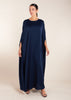 Add a touch of elegance to your wardrobe with our Crinkled Kaftan Navy. Made from a lightweight soft crinkle non-crease fabric, this gown is perfect for warmer weather. Dark blue loose fit kaftan