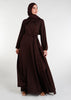 This mid-weight abaya boasts a subtle shine and features a flared silhouette, an oriental-style neckline, self fabric buttons and includes an optional belt. Dark brown colour. 