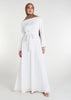 This fully lined white abaya boasts subtle pleats strategically placed at the waist to gently accentuate your figure. An optional belt is included for those who prefer a cinched waist.&nbsp;